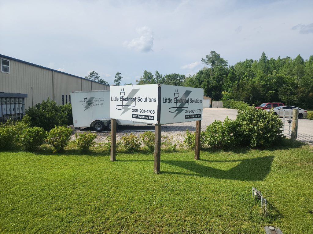 Little Electrical Solutions job-site sign and equipment trailer at their Bunnell, FL location